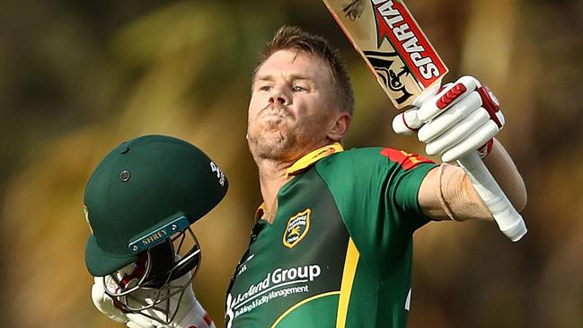 David Warner celebrates bringing up his century for Randwick Petersham in Sydney grade cricket last month. Picture: Getty Images