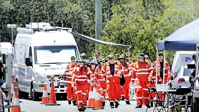 Police and SES set up at the search site near Pimpama on Saturday. Pic: Luke Marsden.