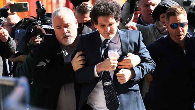 Sam Bankman-Fried arrives at Manhattan Federal Court on March 30 in New York City. He has been charged with criminal counts of fraud, conspiracy, bribery and money-laundering offences. Picture: Michael M. Santiago/Getty Images/AFP