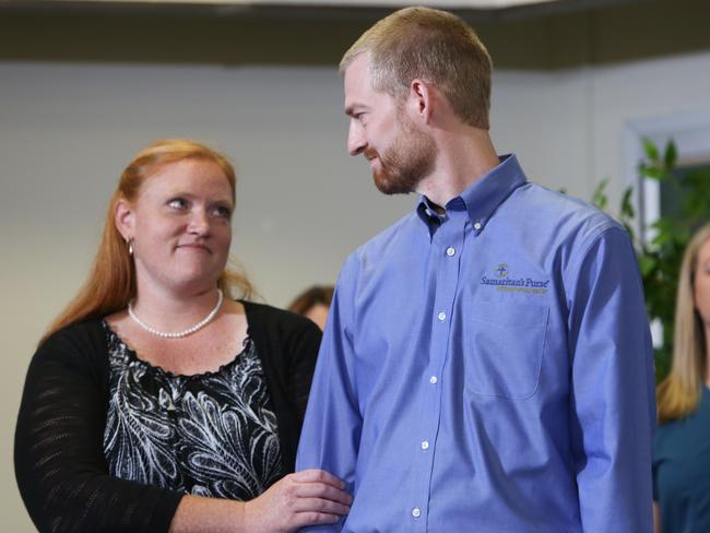 Dr. Kent Brantly stands with his wife, Amber after his release from hospital. Picture: Jessica McGowan