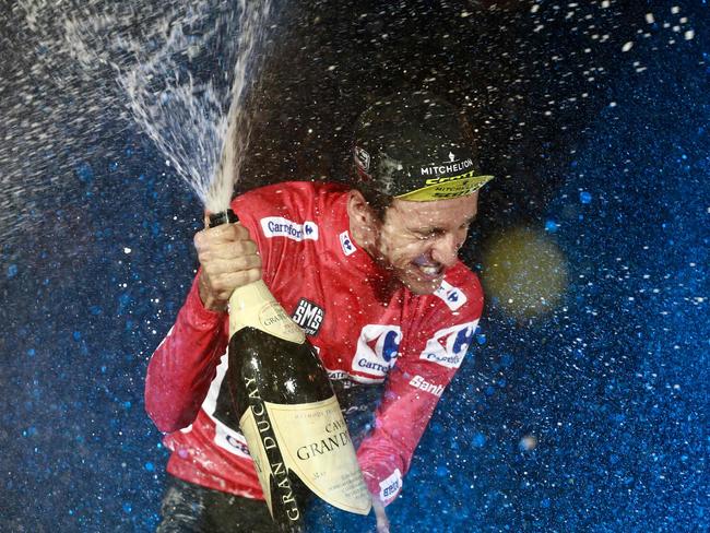 Mitchelton-Scott's British cyclist Simon Yates celebrates on the podium. Picture: AFP