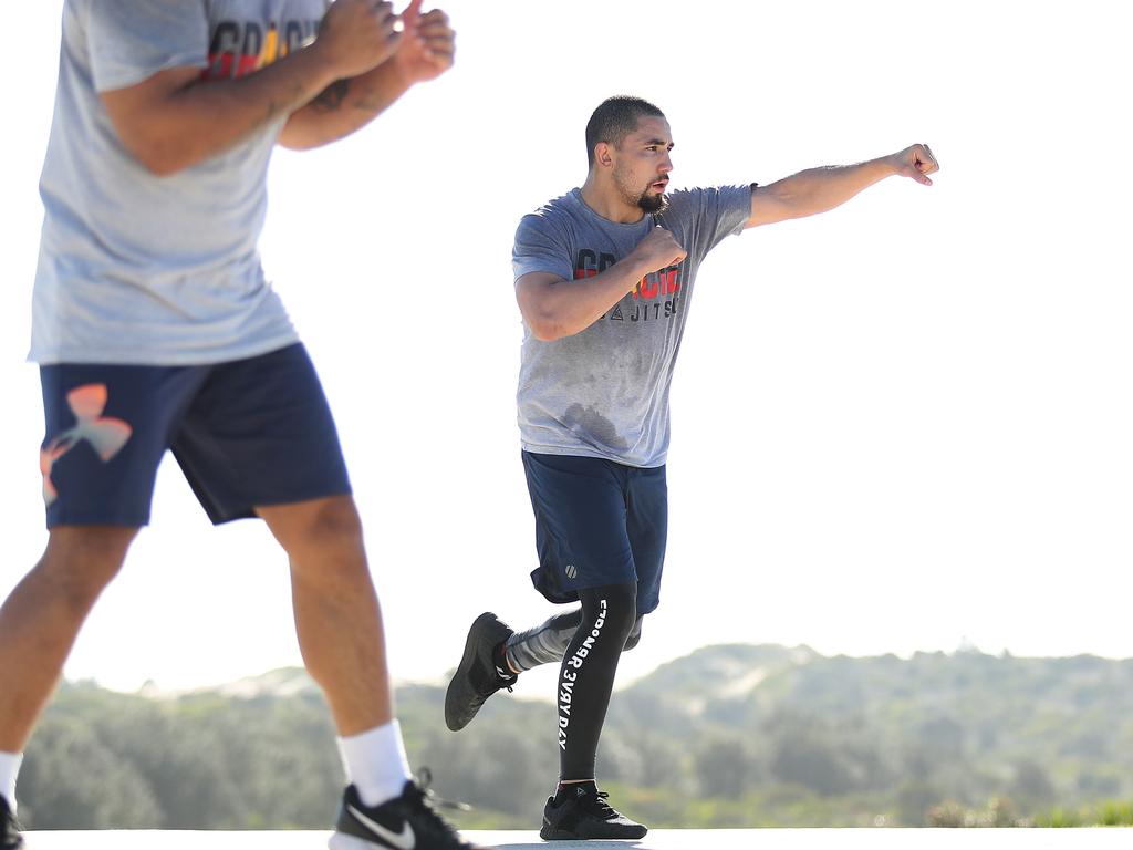 UFC fighter Rob Whittaker training at Wanda sand dunes, Cronulla. Picture: Brett Costello