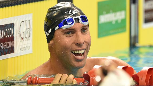 Grant Hackett smiles after competing in his Men's 400m Freestyle heat of the Australian Swimming Championships in 2016. (AAP Image/Dave Hunt)