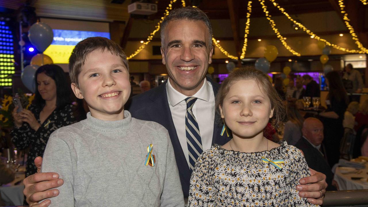 10/5/22 - The Advertiser Foundation Ukraine Fundraiser lunch at the Arkaba - Premier Peter Malinauskas with Anastasia, 8, and Max, 10, Lada. Picture: Naomi Jellicoe