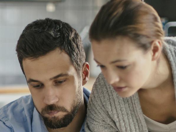 Photo of a couple going through financials problems