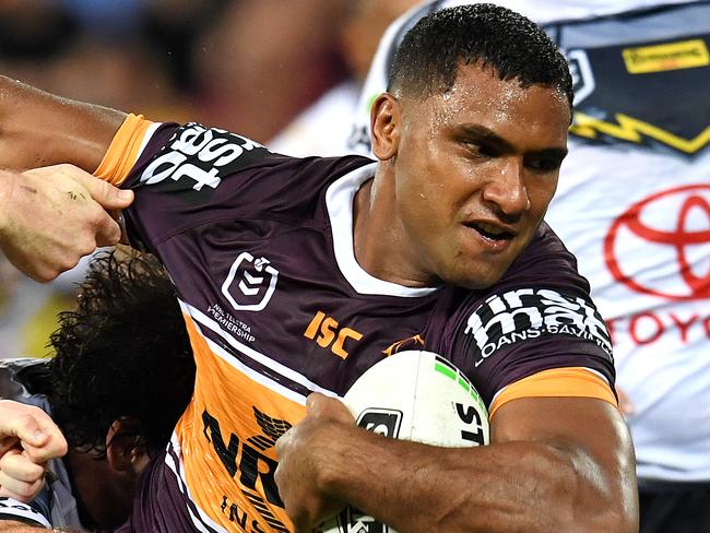 Tevita Pangai Junior of the Broncos (centre) in action before scoring a try during the Round 2 NRL match between the Brisbane Broncos and the North Queensland Cowboys at Suncorp Stadium in Brisbane, Friday, March 22, 2019. (AAP Image/Dan Peled) NO ARCHIVING, EDITORIAL USE ONLY