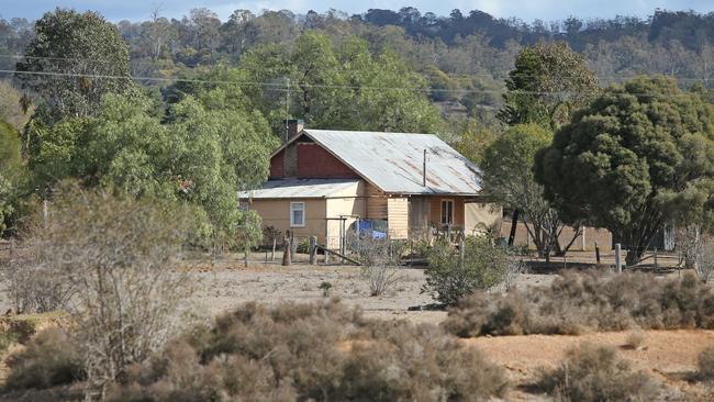 A home on the land that was sold to a developer for $70 million in Cawdor. Picture: Richard Dobson