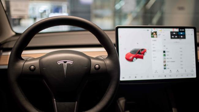 The inside of a Tesla car Model 3. The carmaker says 2021 deliveries grew at the fastest pace in years. Photo: Nicolas Asfouri/AFP.