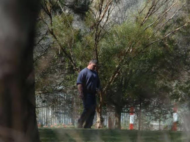 AFP agents watched as Pasquale Barbaro left the table and walked through the park to his Mazda ute, opened the door, leant into the cabin, and returned to the table with something in his hand. Picture: Australian Federal Police.