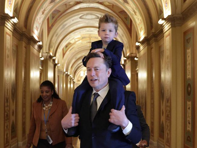 Tesla CEO Elon Musk arrives on Capitol Hill with his son X A A-Xii. Picture: Getty Images via AFP