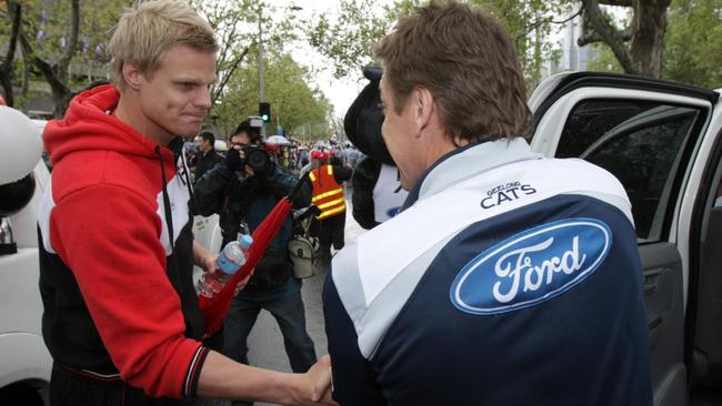 St Kilda Captain Nick Riewoldt shakes hands with Geelong Coach Mark Thompson before the 2009 AFL Grand Final Parade.