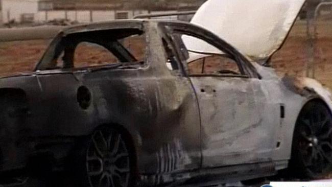 The charred shell of the car believed to have been used in drive-by shooting. Picture: Channel 10