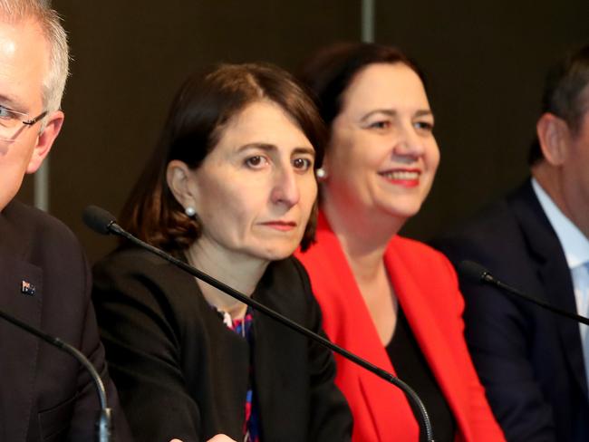 Gladys Berejiklian, left, wants her Queensland counterpart, Annastacia Palaszczuk to pay their part for quarantine hotels.