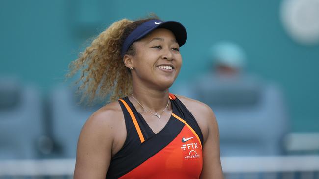 MIAMI GARDENS, FLORIDA - MARCH 28: Naomi Osaka of Japan celebrates after defeating Alison Riske of United States during the Womenâ&#128;&#153;s Singles match on Day 8 of the 2022 Miami Open presented by ItaÃº at Hard Rock Stadium on March 28, 2022 in Miami Gardens, Florida. Mark Brown/Getty Images/AFP == FOR NEWSPAPERS, INTERNET, TELCOS &amp; TELEVISION USE ONLY ==