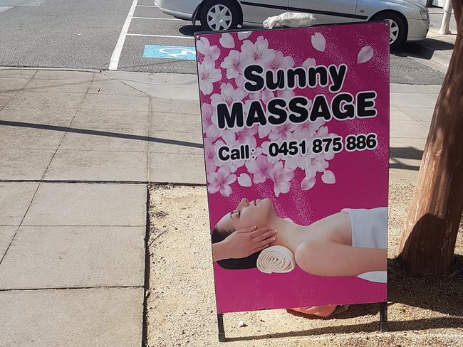 Sunny Massage in Cheltenham is leaving its front door open, heavily concealing a notice proscribing it as an illegal brothel. 