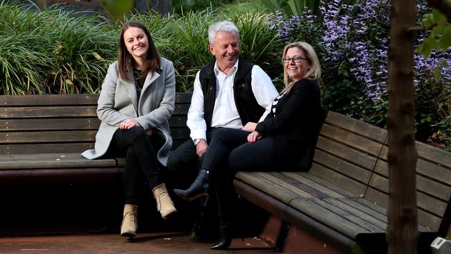 Micro-X executive assistant to the Managing Director Hannah Cox, Managing Director Peter Rowland and Chief Financial Officer Georgina Carpendale in the gardens near their Tonsley headquarters. Picture: Calum Robertson