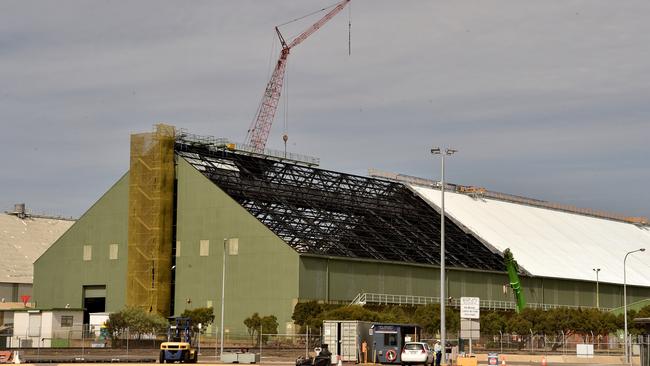 Re-roofing under way in a sugar shed at Townsville port in 2021. Picture: Evan Morgan