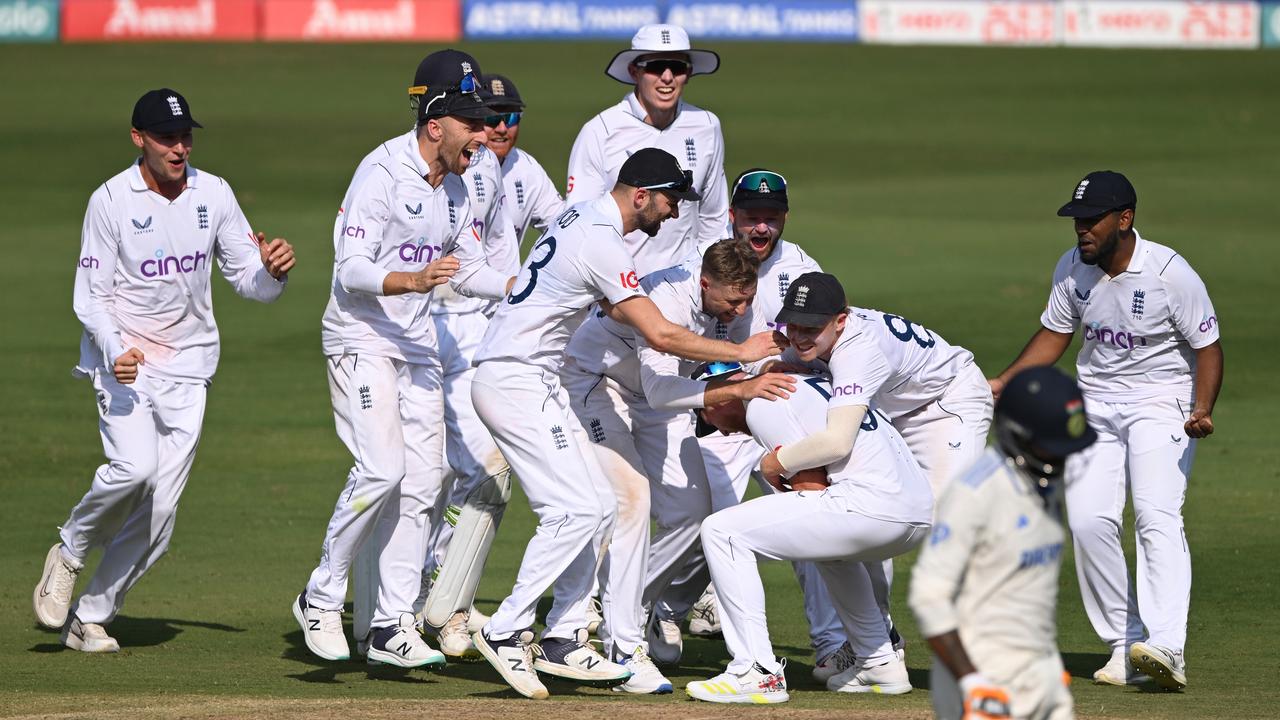 England captain Ben Stokes (r) celebrates with team mates after his run out. Photo by Stu Forster/Getty Images.