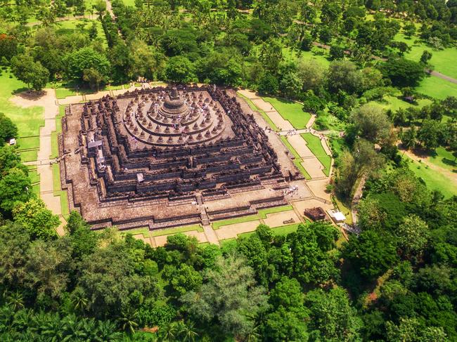 ESCAPE: Aerial view of the mandala-shaped Borobudur temple, the world's largest Buddhist monument, in Central Java, Indonesia. Picture: Istock