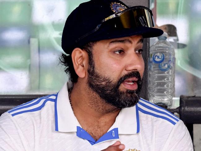 India's captain Rohit Sharma waits for the after-match presentation on on the third day of the second cricket Test match between Australia and India at the Adelaide Oval in Adelaide on December 8, 2024. (Photo by William WEST / AFP) / -- IMAGE RESTRICTED TO EDITORIAL USE - STRICTLY NO COMMERCIAL USE --