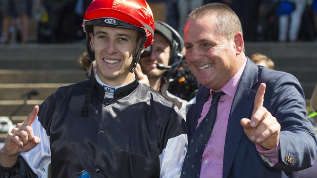 Jockey Jordan Childs and trainer Grahame Begg were all smiles after Written By’s win in the Pago Pago Stakes. Picture: AAP