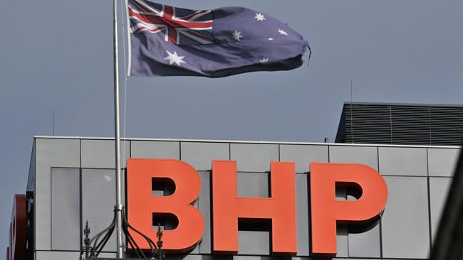 ADELAIDE, AUSTRALIA - NewsWire Photos APRIL 17, 2024: The old Adelaide GPO clock tower on the corner of King William St and Franklin St, now part of the Marriott hotel. With BHP signage. Picture: NCA NewsWire / Brenton Edwards