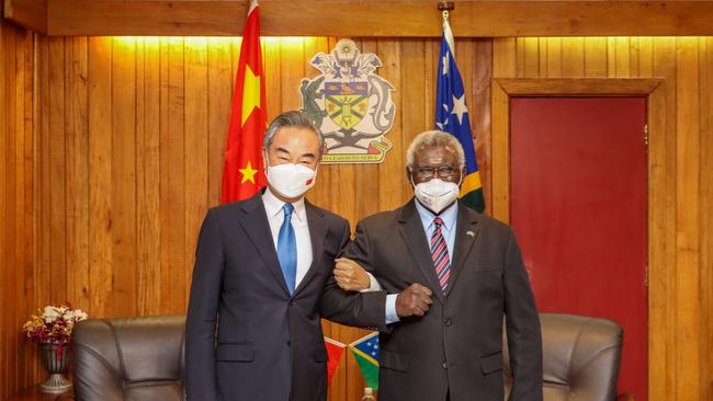 Solomon Islands Prime Minister Manasseh Sogavare meets with visiting Chinese State Councilor and Foreign Minister Wang Yi in Honiara. Picture: Xinhua via Getty Images.