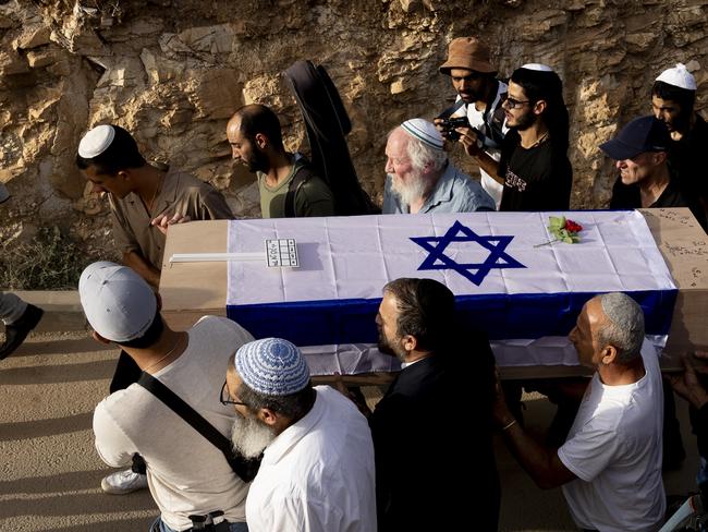 Family members and friends carry the coffin during a funeral service for Shani Louk who was killed near the Nova music festival site. Picture: Amir Levy/Getty Images