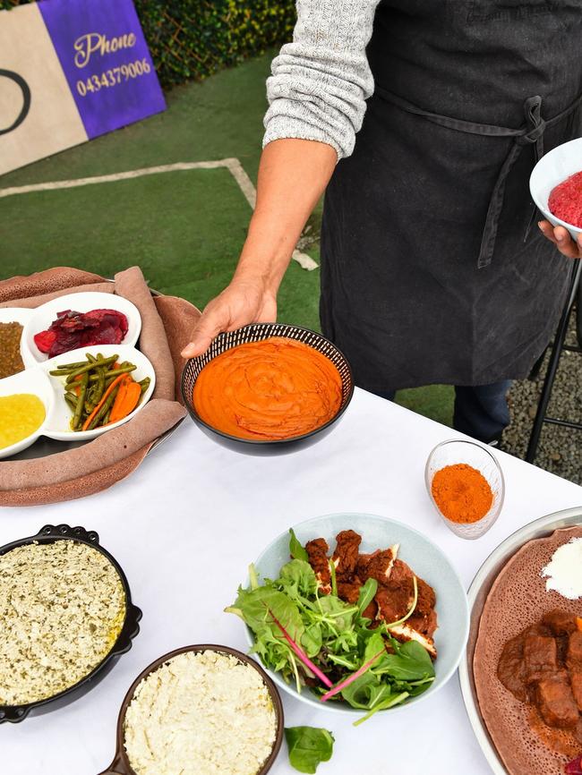 The Queen Sheba Ethiopian food truck in Hobart run by Yodit Tafera and Zemenay Gebremichael where they have slow-cooked beef with injera; gnocchi with lamb and kale and egg frfr on the menu among other delicacies. Picture: Olivia Hasler, Lousy!