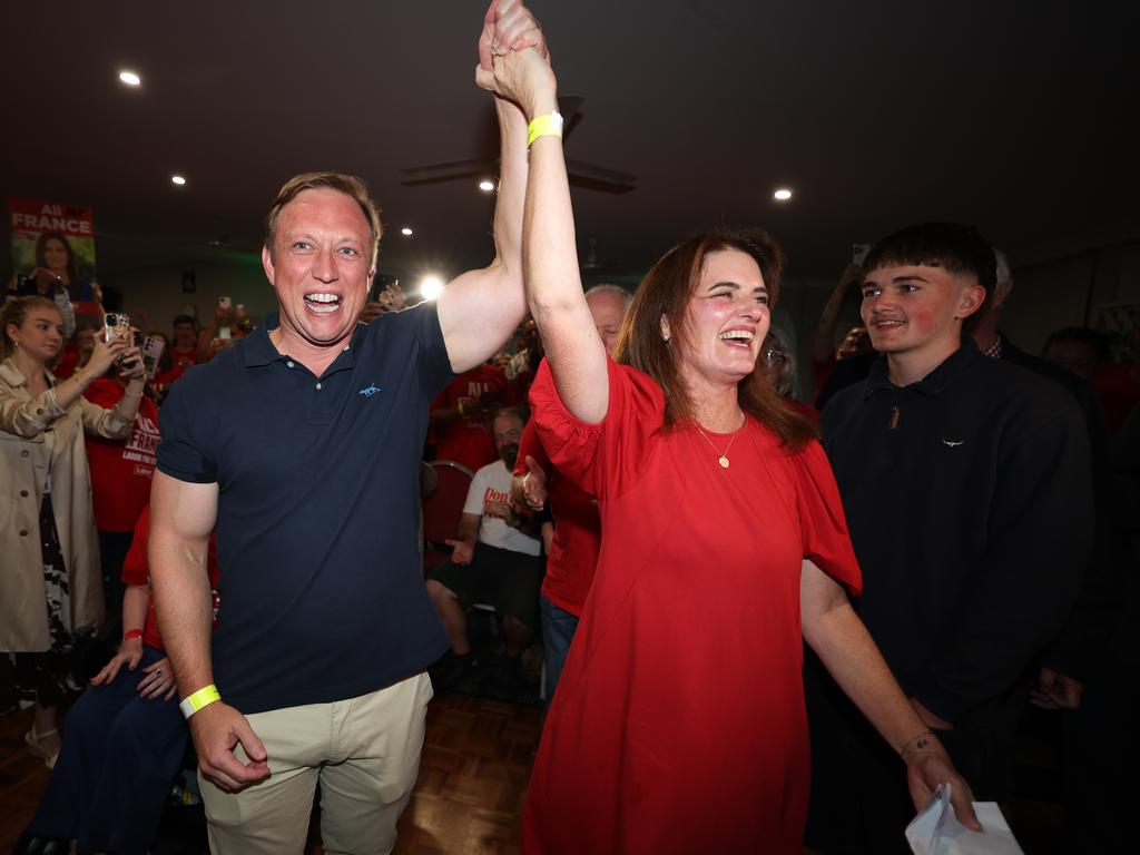 Ali France celebrates her win with former Queensland premier Steven Miles. Picture: Annette Dew