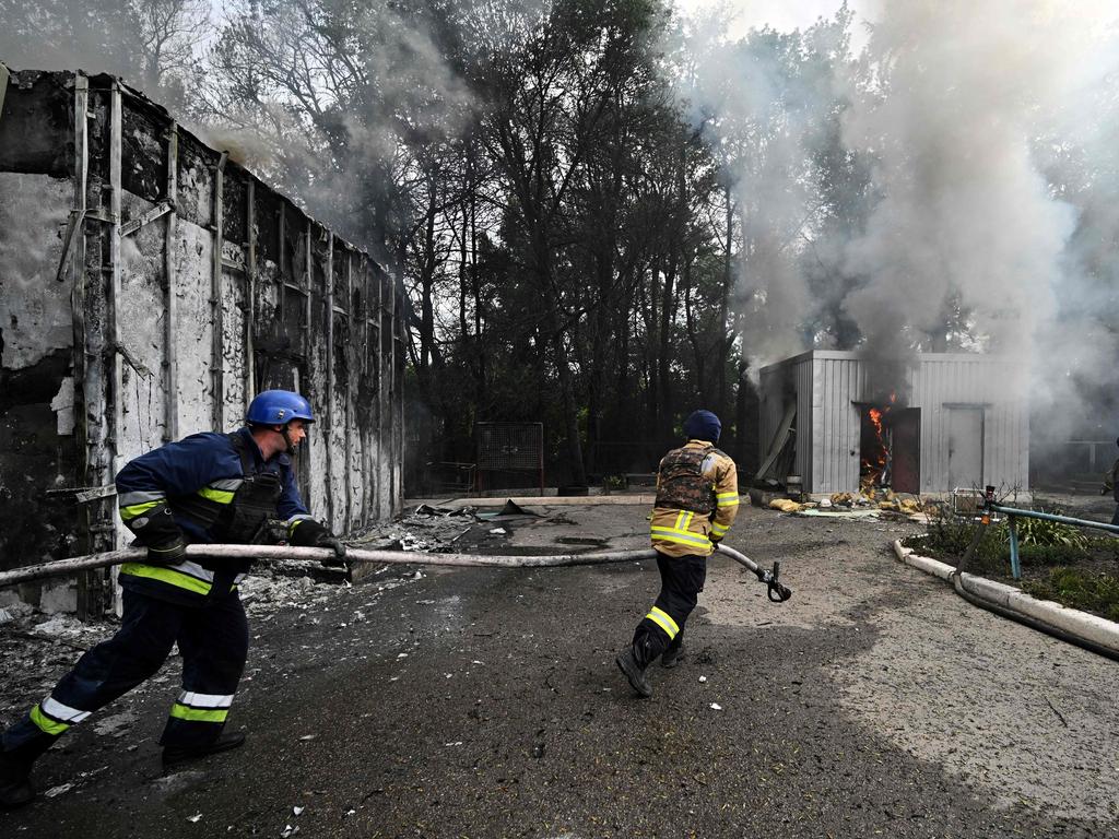 Ukrainian firefighters fight against a fire at a petrol station, which was hit by a Russian strike in the town of Kostyantynivka, Donetsk region. It has been struck again. Picture: AFP