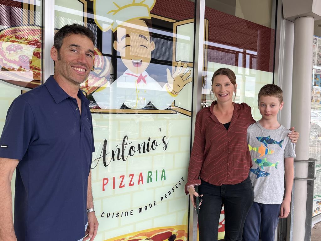 Tony Martinico, Rose May and their son outside their new business, Antonio's Pizzaria.
