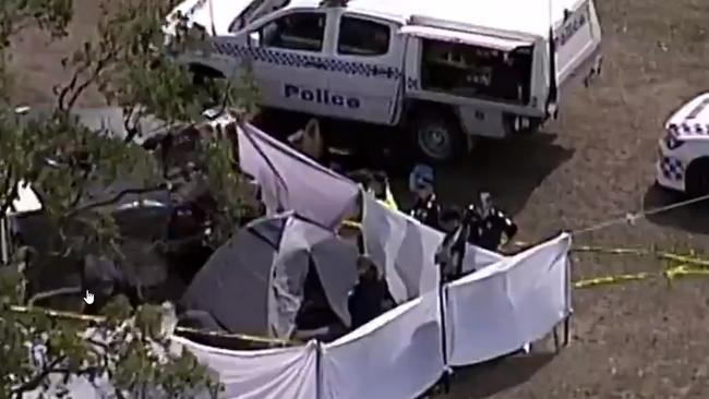 Police investigate the scene where two young campers at the weekend’s Rabbits Eat Lettuce Festival, were found dead in their tent. Picture: 9news 