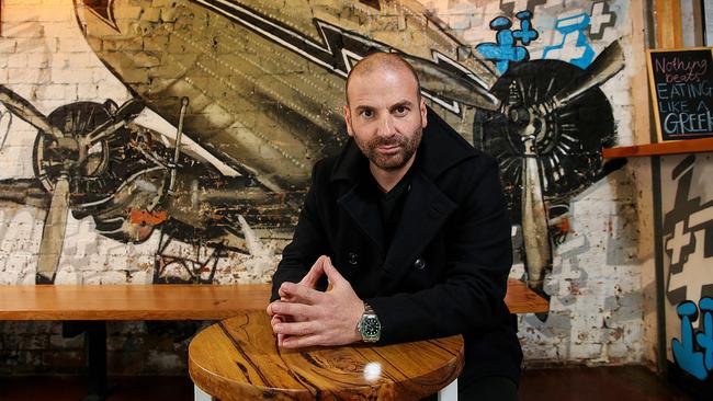 Celebrity chef George Calombaris, pictured at Jimmy Grants in Fitzroy, Melbourne, wants to expand his restaurants in Australia and overseas. Picture: Ian Currie