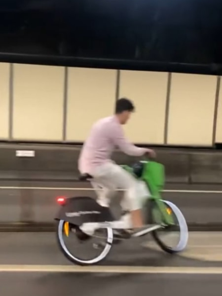 The man checks for cars before crossing lanes. Picture: TikTok