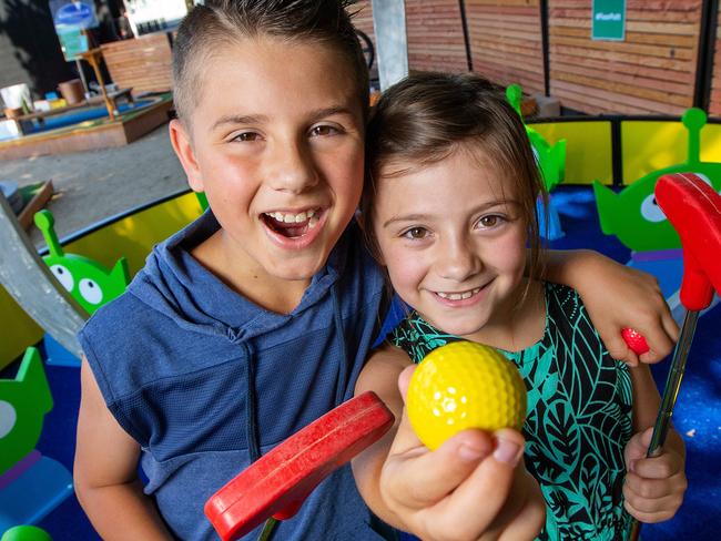 AustraliaÕs newest pop-up 18-hole mini golf experience - Pixar Putt at Fed Square. Murat, 10, and Sarah, 8. Picture: Mark Stewart