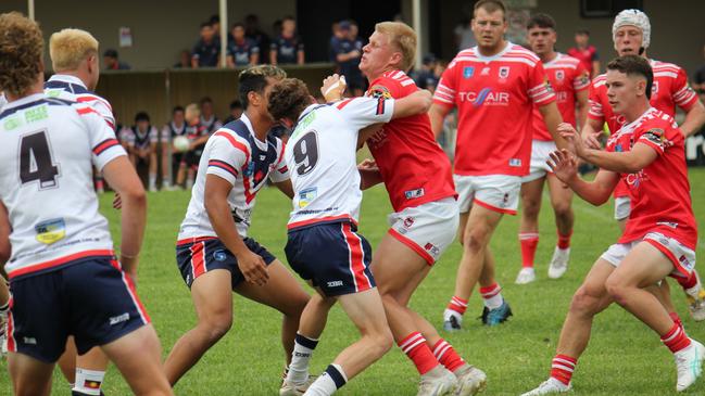 Dreau Clark takes a hit up for the Illawarra South Coast Dragons Laurie Daley Cup team. Picture: Kevin Merrigan