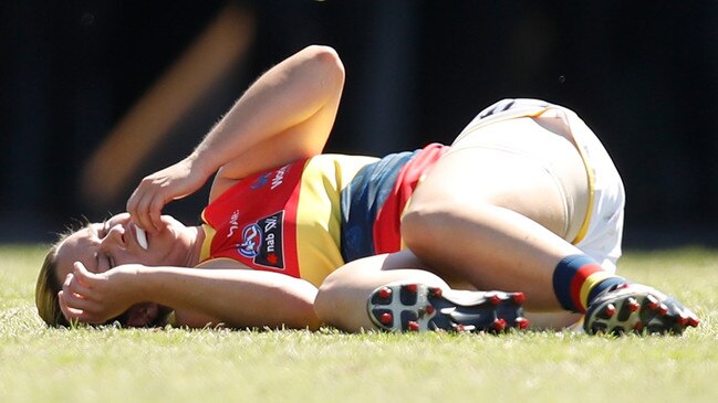 Cramey lies on the oval, injured in a clash against Collingwood in 2017. Picture: MICHAEL WILLSON/AFL MEDIA/GETTY IMAGES