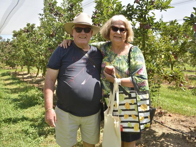 Mark and Liza enjoying a day out apple picking at Nicoletti Farms during Stanthorpe's Apple and Grape Harvest Festival on Saturday, March 2, 2024. Photo: Jessica Klein