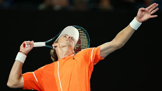 Alex de Minaur struggled early on his first serve before finding rhythm to thrash Italian Matteo Arnaldi in straight sets on Rod Laver Arena. Picture: Cameron Spencer / Getty Images