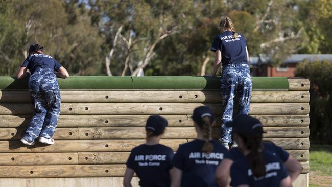 Air Force female technical camp participants take on a confidence course at RAAF Base Wagga.