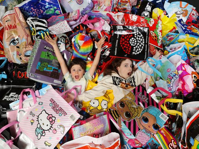 The large selection of Showbags that will be on offer at this year's Melbourne Royal Show. Siblings Harry 6 and Cate 9 work their way through all the showbags on offer to find their favourite bag.                     Picture: David Caird