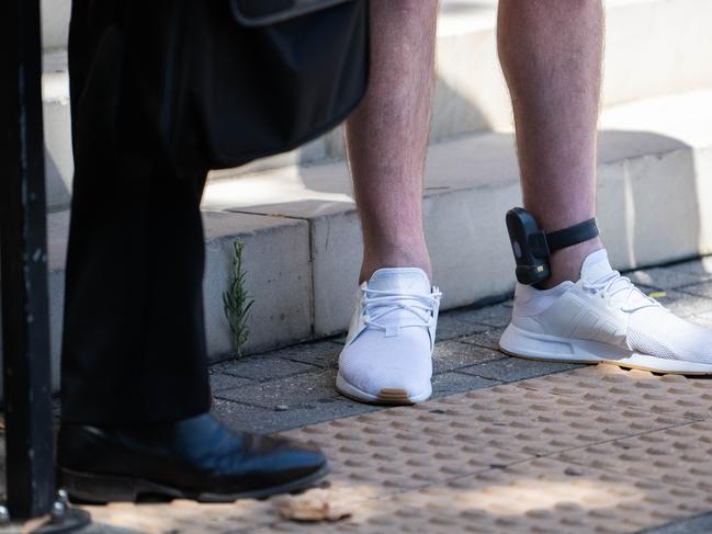 ADELAIDE/ KAURNA YARTA, AUSTRALIA - NewsWire Photos FEBRUARY 13, 2024: Ankle bracelets for electronic monitoring by police are seen being worn outside of Adelaide Magistrates Court. Picture: NCA NewsWire / Morgan Sette