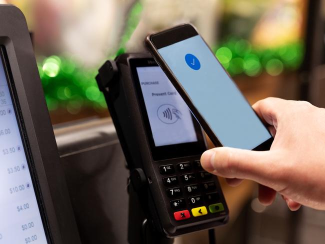 Eftpos Machine at Self Checkout in a supermarket; credit card smartphone generic