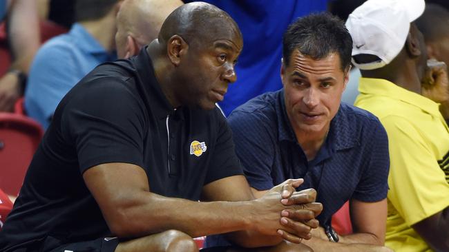 Los Angeles Lakers president of basketball operations Magic Johnson (L) and Lakers general manager Rob Pelinka.