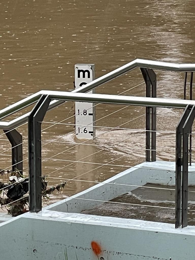 A water gauge sits at 1.5m at 11.40am on Monday near the Parramatta wharf.