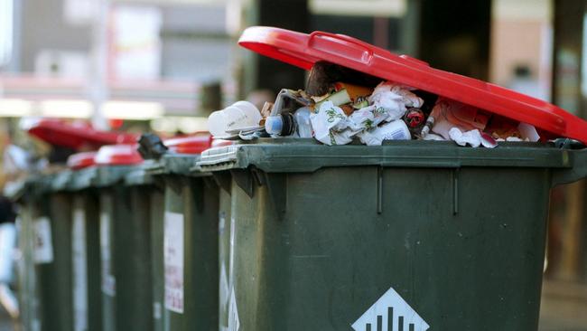 Hobsons Bay council has cut back rubbish bin collections to once every two weeks, leaving residents angry at overflowing waste.