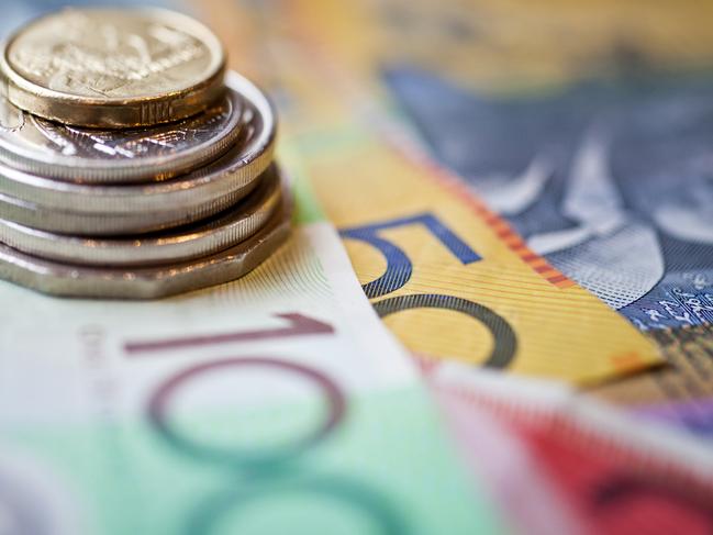 Stack of Australian dollars, cash money generic