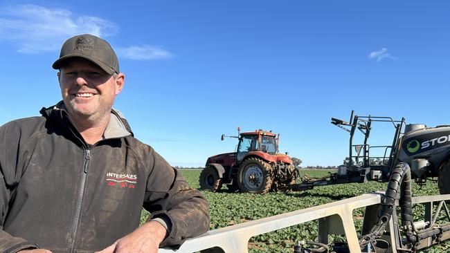 Richard Jennings of Berry Jerry in southern NSW pictured in his crop of canola. Picture: Nikki Reynolds.