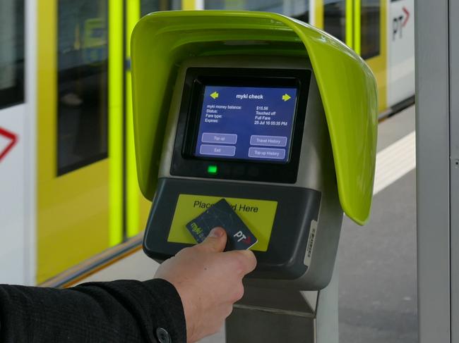 A new myki Quick Top Up machines in action at Domain Interchange.